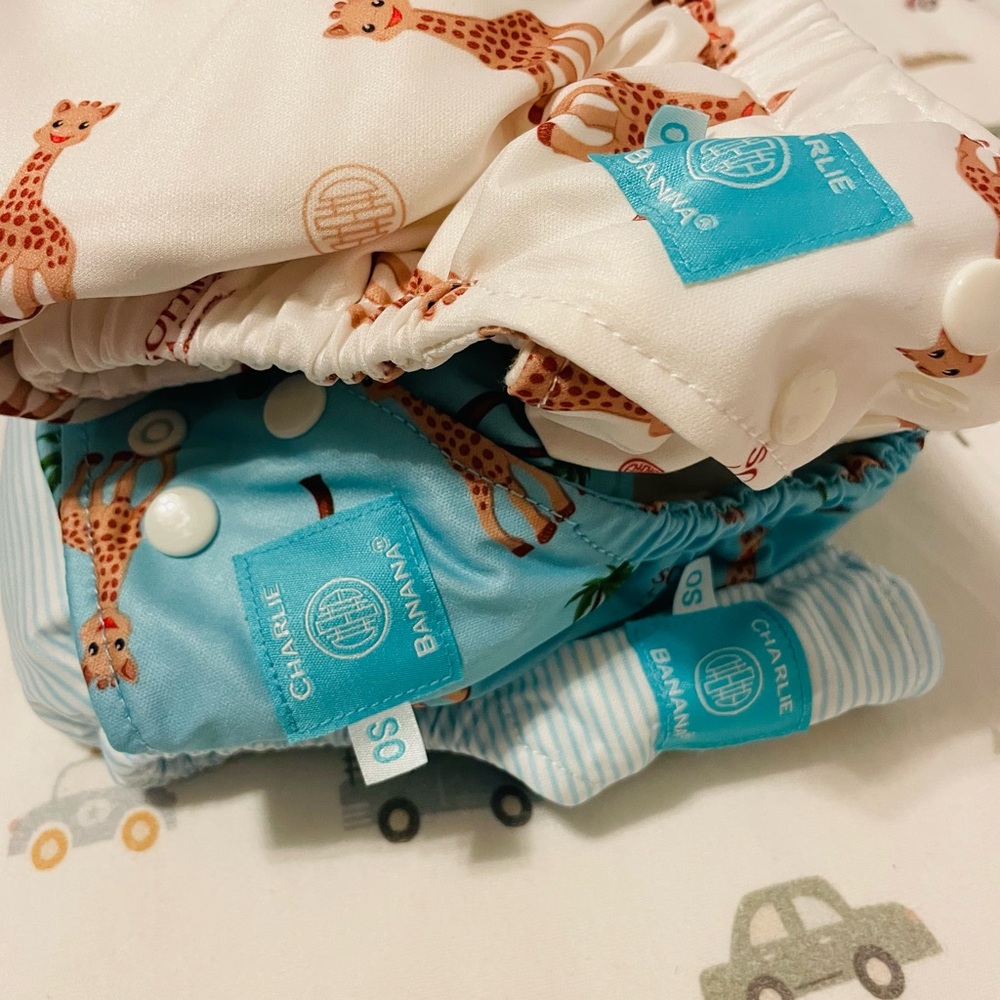 THREE Charlie Banana Pocket Cloth Diapers (one size)